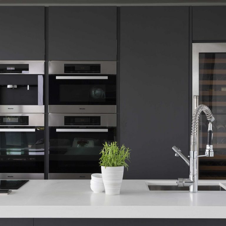 Matte grey kitchen with white units