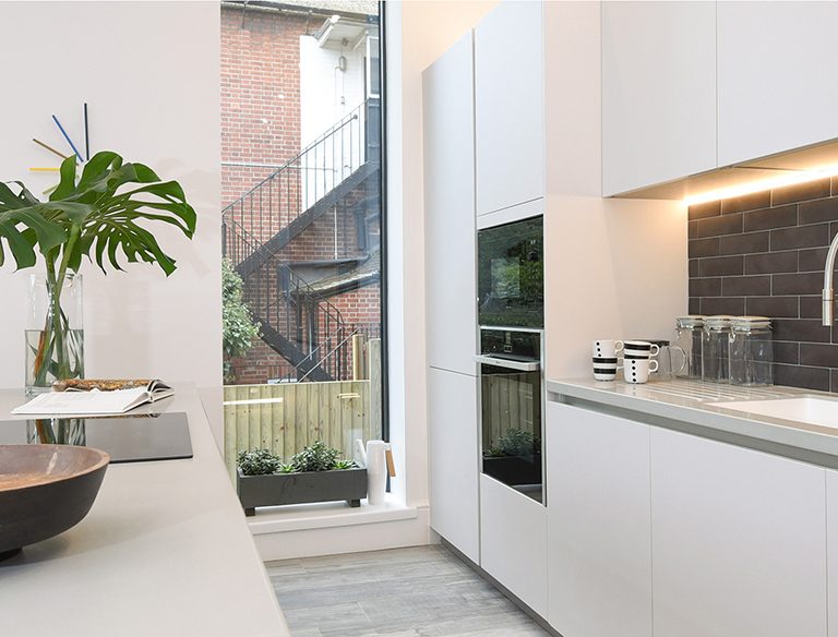 Kitchen plan with island and long window