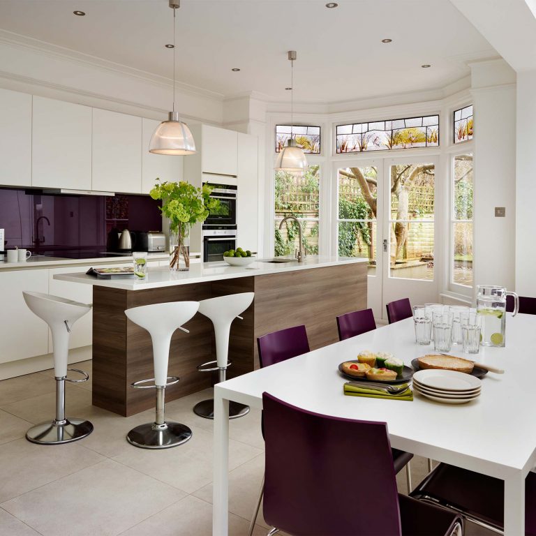 Open plan white and purple kitchen plan