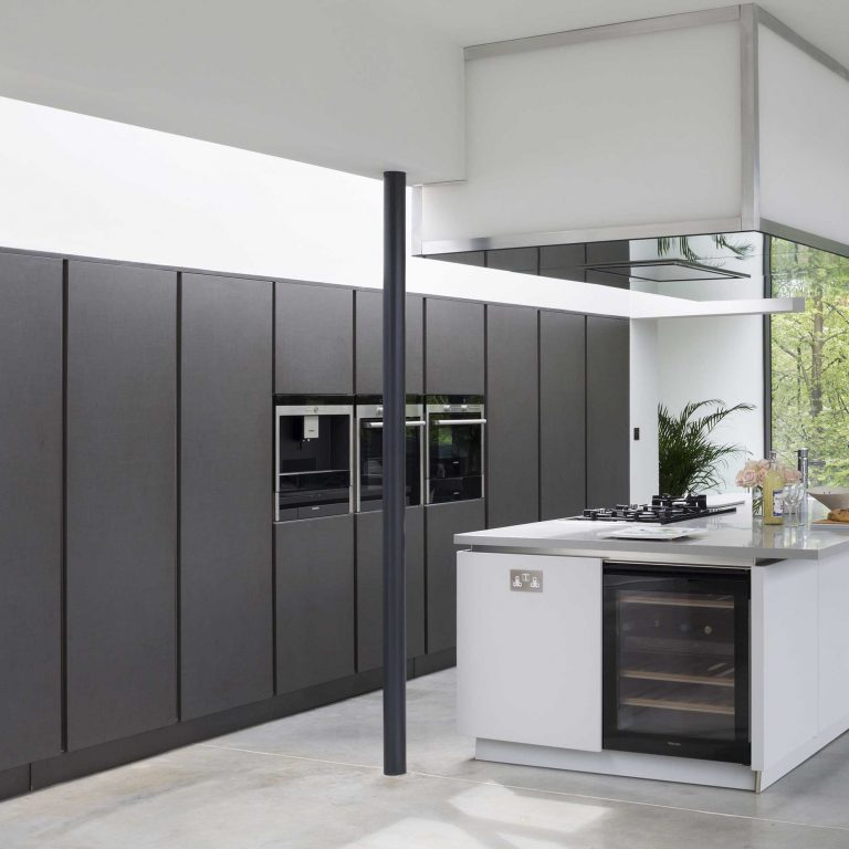 Black seamless kitchen design with white units